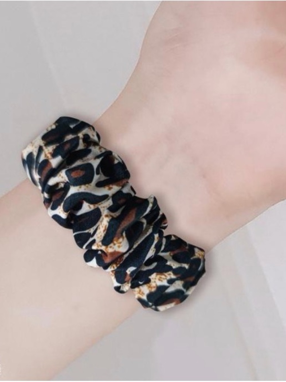 Elastic scrunchie watch band will comfortably adjust to the size of your wrist